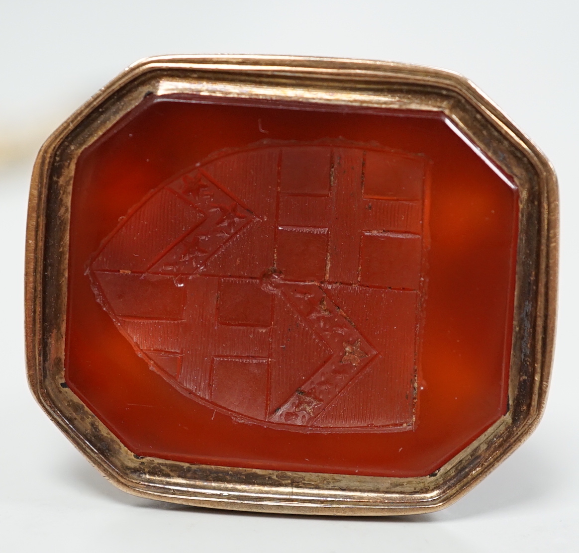 A 19th century yellow metal overlaid and carnelian set fob seal, 39mm, a 585 ring with bust, a pair of tortoiseshell mounted lorgnettes, an 18k coral and green hardstone set rose brooch and a yellow metal and hardstone b